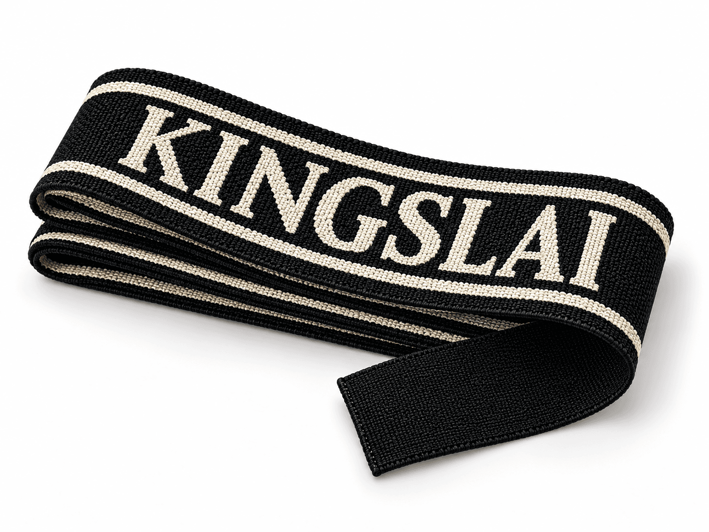 38 mm ultra soft jacquard elastic in a flat fan fold with its plain reverse visible at the turned end